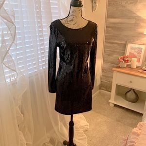 Black sequin mini; size medium.